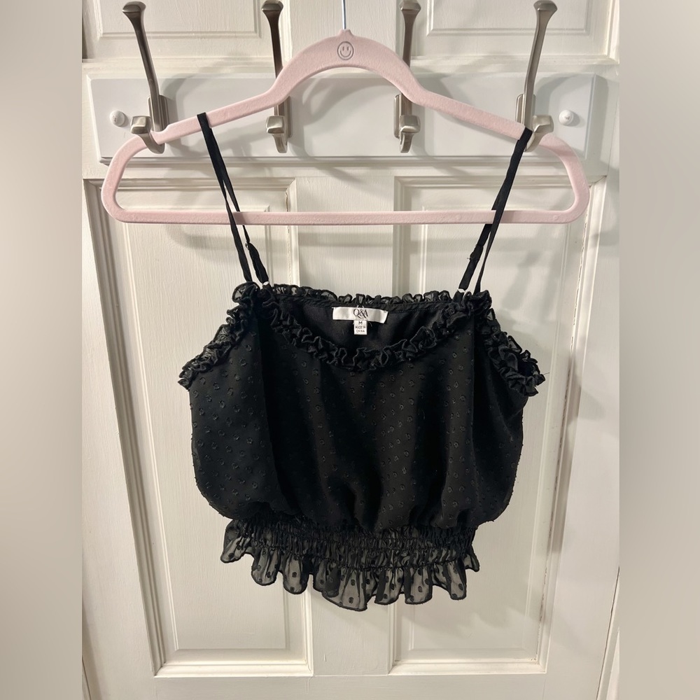 Black going out top